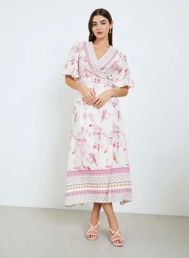 ستايلي فستان طويل بطبعة زهور وحافة واسعة مع أكمام قصيرة